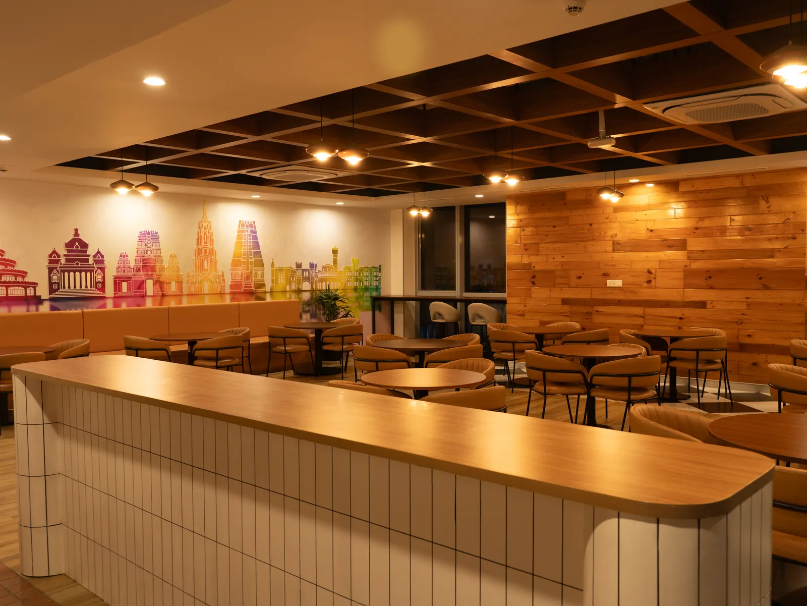 Cafeteria with timber wall cladding and mural — Moschip